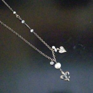 Silver Fluer de lis necklace